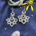 گوشواره آویز گل نقره ای